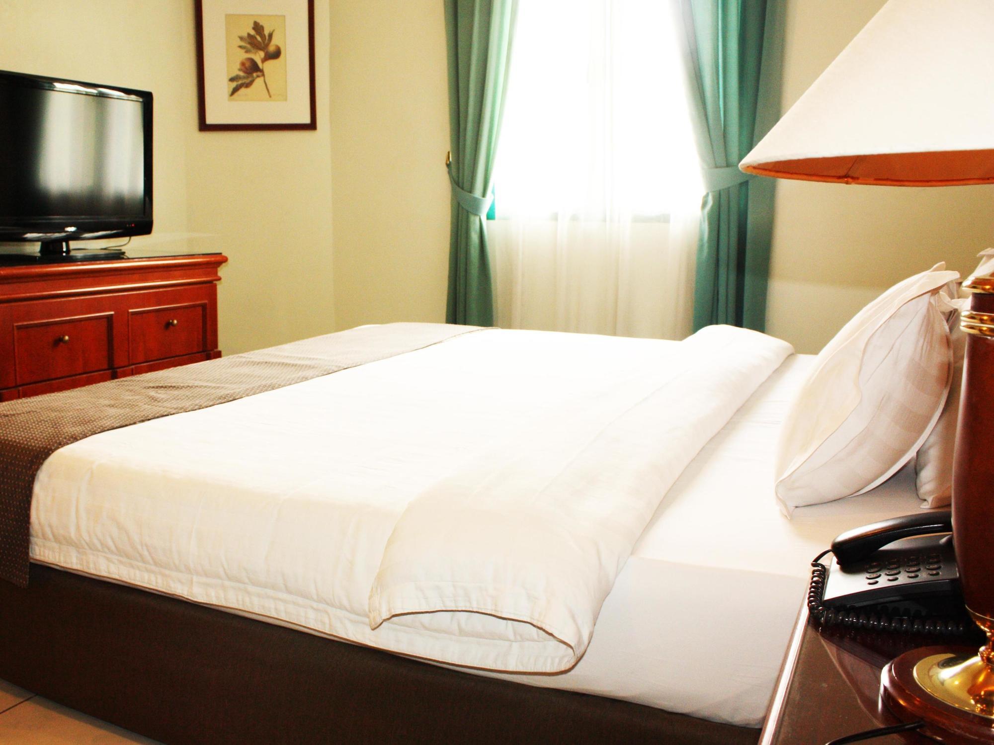 Travellers Suites Serviced Apartments Медан Экстерьер фото